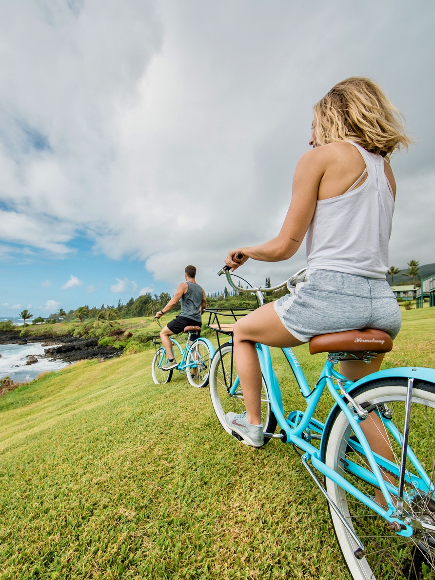Riding bikes around resort grounds in Hana, Maui.