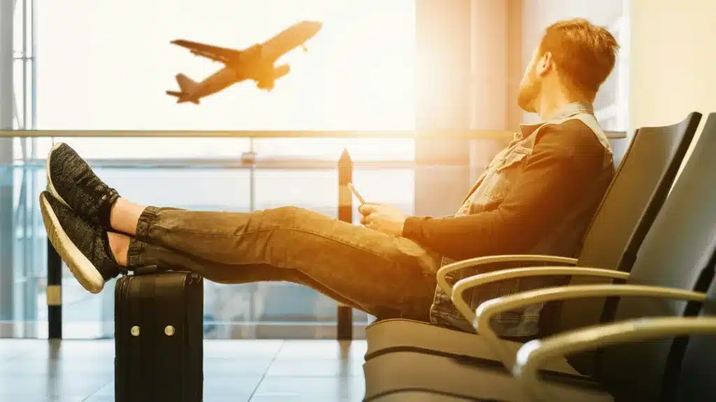 Man travelling at the airport - Travel Planning Services - Total Advantage Travel & Tours